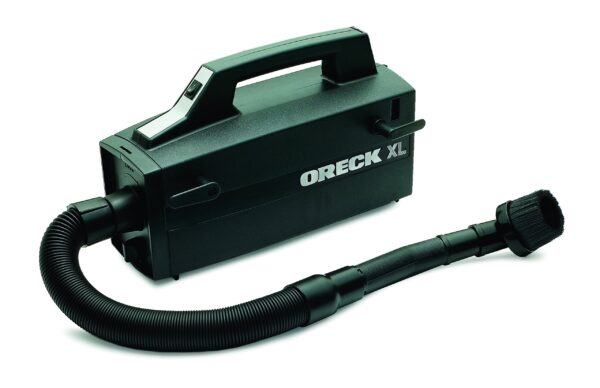 The Oreck Super Deluxe Canister Vacuum Cleaner is a versatile cleaning tool, weighing only 5 pounds. It comes with a full set of attachments for various surfaces, from high ceilings to delicate art objects. Equipped with hypoallergenic disposable dust bags, it ensures a dust-free cleaning experience.